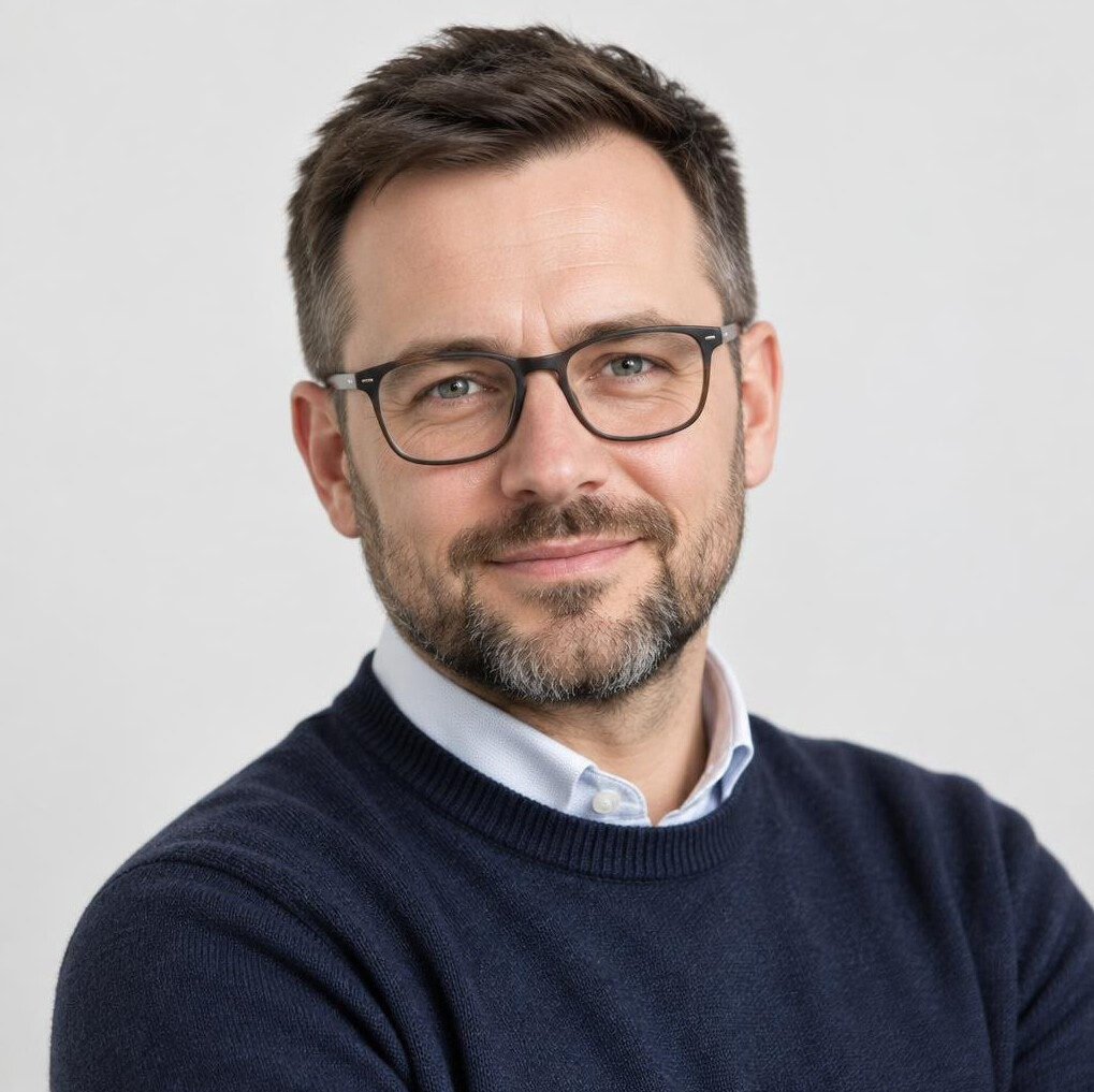 Portrait of a bearded man in glasses